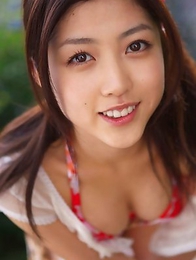Azusa Togashi shows sexy body in bath suit unde sun light